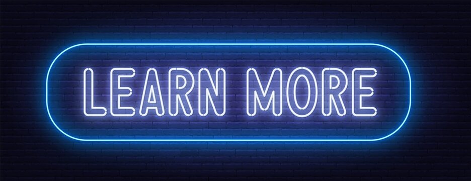 Learn More neon sign on brick wall background