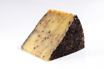 Closeup of tasty fresh cheese with malt on the white background