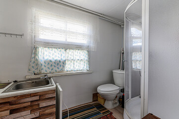 Russia, Moscow- May 03, 2020: interior room apartment modern bright cozy atmosphere. general cleaning, home decoration, preparation of house for sale. bathroom, sink, decor elements, toilet