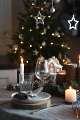 christmas table setting with candles