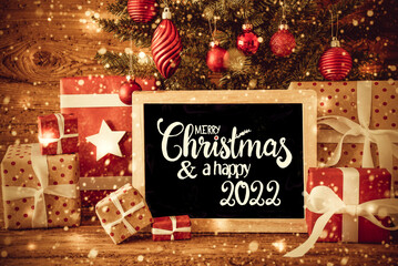 Obraz na płótnie Canvas Christmas Tree, Gift, Text Merry Christmas And A Happy 2022, Snowflakes