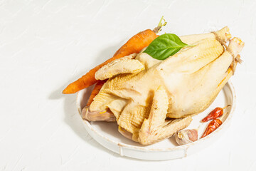 Whole free-range chicken poultry. Organic farm food, trendy hard light, dark shadow