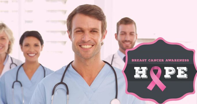 Animation of breast cancer awareness text over smiling diverse doctors at hospital