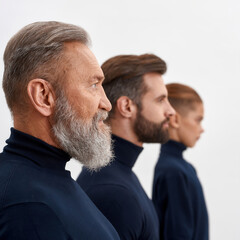 Crop of three generations of Caucasian men faces