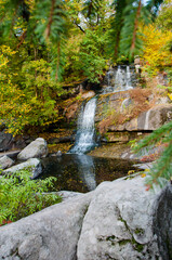 Fototapeta na wymiar beautiful waterfall view outside in autumn nature