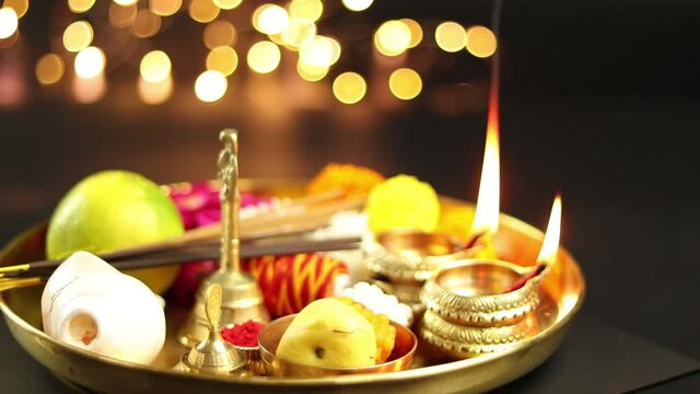 Rotating Golden Pooja Ki Thali Decorated With Mithai, Diya, Deep, Flowers, Genda Phool, Shankh, Roli, Kumkum, Agarbatti, Ghanti, Raksha, Moli. Theme For Navratri, Dussehra Puja, Karva Chauth, Teej
