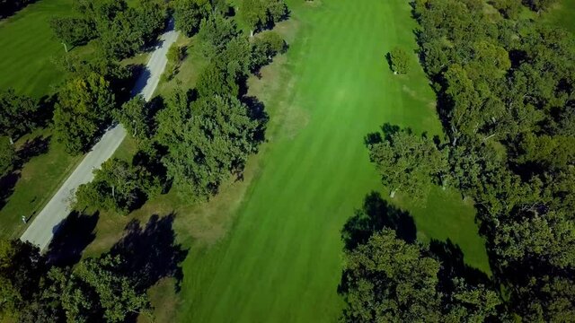 aerial images of a golf course during a game