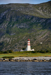 Fototapeta na wymiar Alnes lighthouse standing tall to warn seafarers