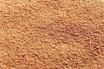 Close up of Biscuit rich golden crumbs. Nice sandy texture of crumbs. Sweet coating for cakes