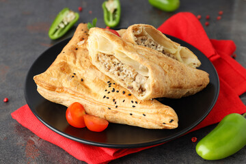 Concept of tasty food with samsa on dark textured background