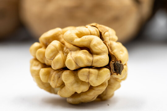 close-up walnut kernel on white background