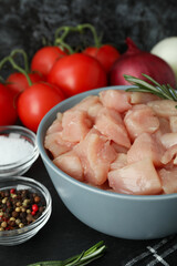 Concept of tasty food with slices of raw chicken fillet, close up