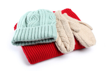 Concept of winter clothes on white background