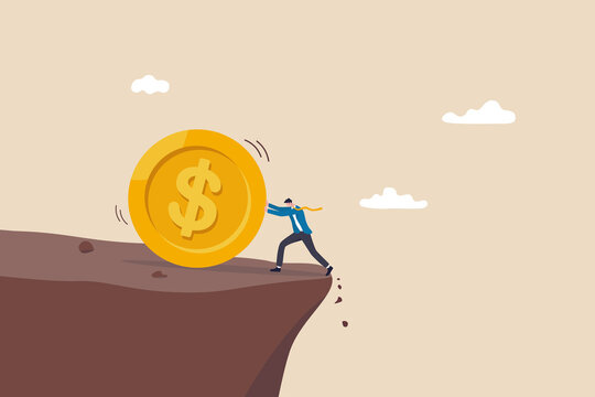 Debt, loan payment or mortgage problem, financial failure or  investment risk, bankruptcy, spending or money mistake concept, frustrated businessman try so hard to push huge money coin from the cliff.
