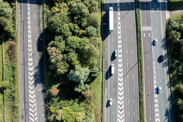Aerial top view of road junction motorway from above, automobile traffic cars, transportation...