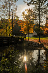 Autumn landscape with a footpath bridge