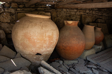 Ancient Greek amphoras for food storage. Antique ceramic jug and pot. Archaeological site antiques