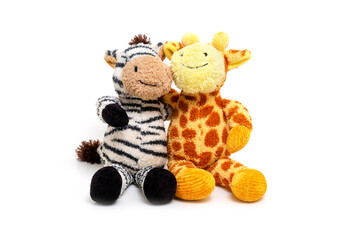 Two soft plush toys zebra and giraffe isolated on white background. My best friends is the concept of a game for young children.