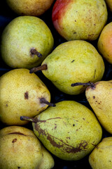 pears on market stall
