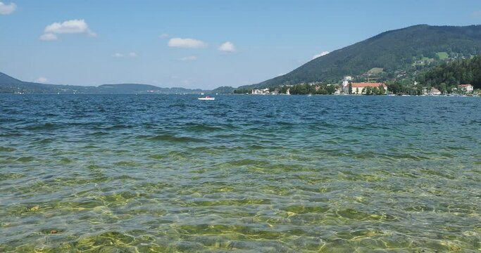 Lake of Tegernsee in Upper Bavaria (Germany) with view on Schloss and Tegernsee Benedictine Abbey from the shore of Rottach-Egern