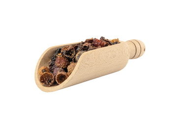 dried rose hip fruit in wooden scoop isolated on white background. Herbs and food ingredients.