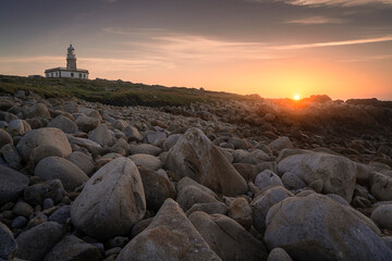 Fototapeta na wymiar Beautiful sunset in the galician coast near Corrubedo lighthouse. Galicia, Spain