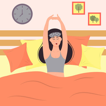 Young woman in sleeping mask is waking up and yawning. Girl is sittting in the bed with pillows. Daily morning routine.