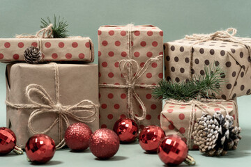 Frame from Christmas gifts, New Year tree, toys on a green background. Christmas composition.