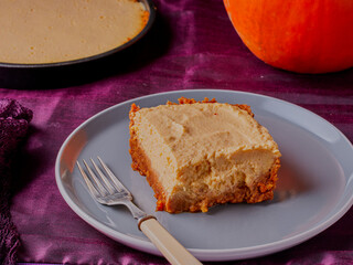 Slice of homemade pumpkin pie.