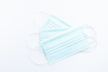 Top view medical mask isolated on white background with copy space. Concept wearing medical mask for protection virus, and distance.