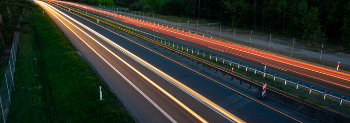 Fototapeta na wymiar lights of moving cars at night. long exposure