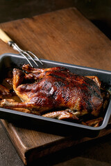 Classic dish roasted glazed duck with apples