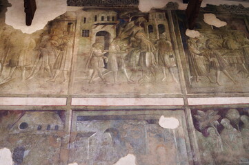 Frescoes on the outer wall of the church of San Leonardo in Assisi, Italy