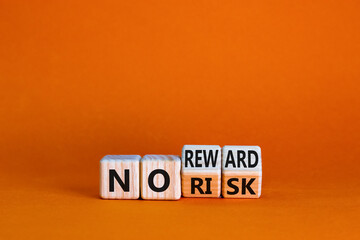 No risk or reward symbol. Turned cubes and changed words 'no risk' to 'no reward'. Beautiful orange...