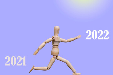 wooden dummy running from 2021 to 2022. New Year's Eve concept