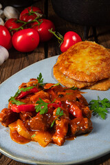 Original Hungarian goulash with potato pancakes