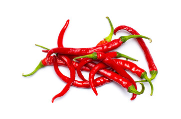 A bunch of hot chili peppers on white, close-up.