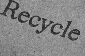 recycle text word written on paper