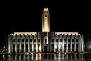 City Hall of Villeurbanne, in the suburbs of Lyon, France, as seen from the Lazare-Goujon Square - Concrete building with a clock tower built in 1934