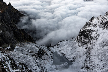 Sunset over foggy inversion in High Tatras mountains national park, Slovakia