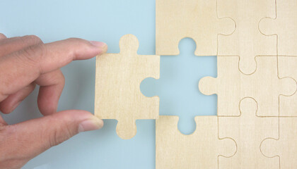 Fototapeta premium Connecting jigsaw puzzle . Business solutions success and strategy concept