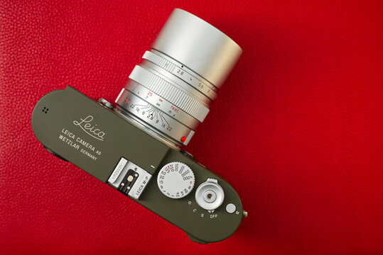 Bangkok/Thailand - March 26, 2023 : Telephoto lens by Leica in Germany since 1990-2007 in name Leica Elmarit-M 90mm F2.8 silver with Leica MP240 safari digital rangefinder camera from 2013.