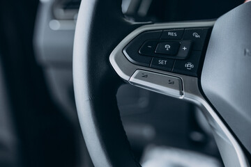 Details of a car standing in car showroom