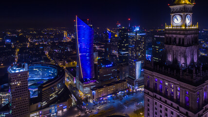 Fototapeta na wymiar Panorama of Warsaw from above, clock on the tower PKiN, downtown, photo from the drone, November 2016, Warsaw, Poland.