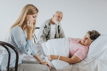 Woman crying in hospital