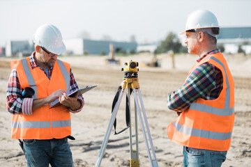 Two builders at work