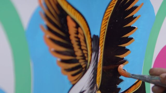 Close-up of painting eagle wings