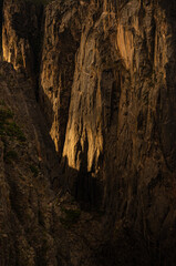 Fototapeta na wymiar Deep Canyon with Morning Light Glowing on Walls