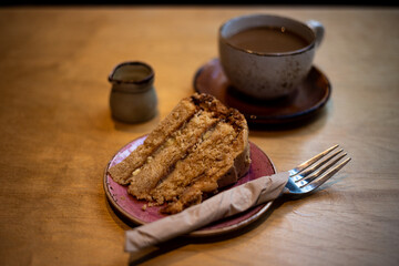 Coffee and cake in cosy cafe