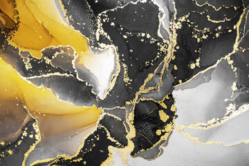 Abstract fluid art painting background in alcohol ink technique, mixture of vivid yellow  black and gold paints. Transparent overlayers of ink create lines and gradients. Burst of creativity. - 464312951